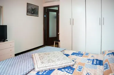 Letto o letti in una camera di 008B - Casa RIVA Vista Mare di fronte alla Spiaggia e Mare a Riva Trigoso