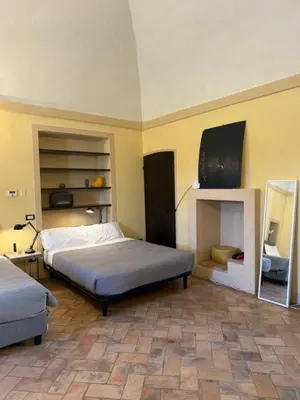 Letto o letti in una camera di Relais Della Corte