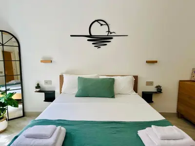 Letto o letti in una camera di Salty Suite