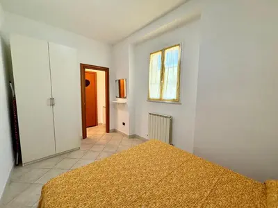 Letto o letti in una camera di Il giardino fiorito