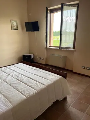 Letto o letti in una camera di Agriturismo Villa San Lorenzo
