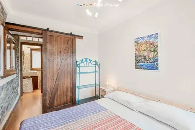 Letto o letti in una camera di Laya Marina, Terre Marine