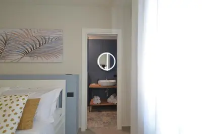 Letto o letti in una camera di CIVICO 8 Reggio Emilia