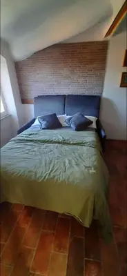 Letto o letti in una camera di Casa valeriano