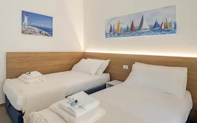Letto o letti in una camera di TEATRINO, a 200 m dal mare con giardino in centro, LEVANTO 5 TERRE