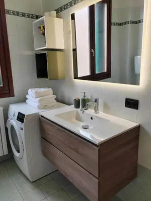 Letto o letti in una camera di Elegante bilocale nel cuore di Rubiera