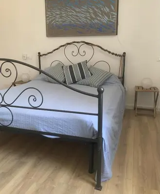 Letto o letti in una camera di La Dolce Vita