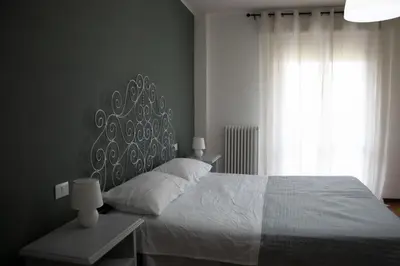 Letto o letti in una camera di B&B San Savino