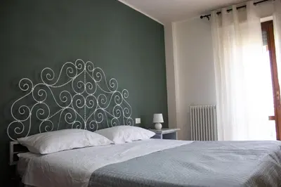 Letto o letti in una camera di B&B San Savino