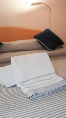 Letto o letti in una camera di La Casetta del Ponte a due passi dal Mare