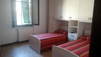 Letto o letti in una camera di Casa Il Sogno