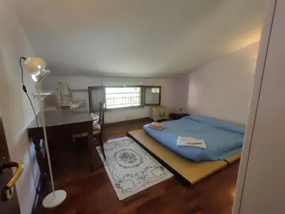 Letto o letti in una camera di B&B Acque chiare