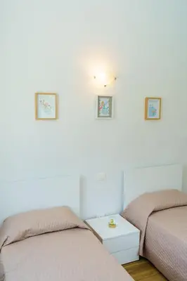 Letto o letti in una camera di Casa Olivieri 05