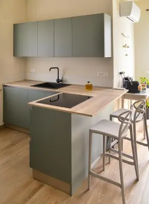 Cucina o angolo cottura di Il Giardino di Eva - Holiday Home - intero alloggio
