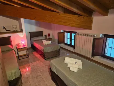 Letto o letti in una camera di Audrey