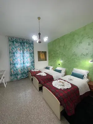 Letto o letti in una camera di Madonna dell'ancora