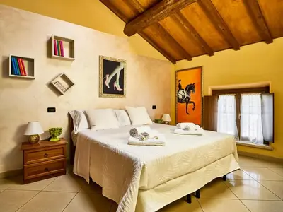 Letto o letti in una camera di Small Luxury A Due Passi Dal Centro