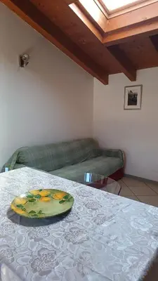 Area soggiorno di Le Mura Holiday Home in Gera