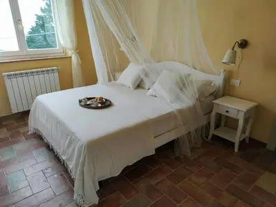 Letto o letti in una camera di Tuscan Villa With Jacuzzi Between Woods And Sea