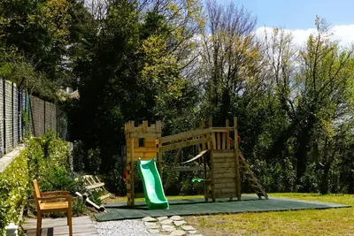 Area giochi per bambini di Tuscan Villa With Jacuzzi Between Woods And Sea