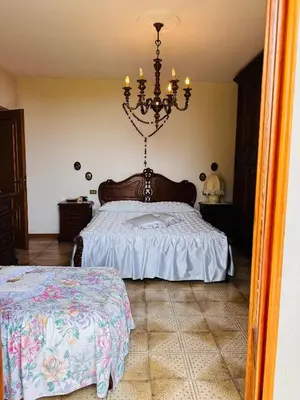 Letto o letti in una camera di Il Giardino di Monterole Cà d'Pini