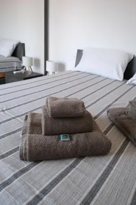 Letto o letti in una camera di Nel Cuore di Rapallo by PortofinoVacanze