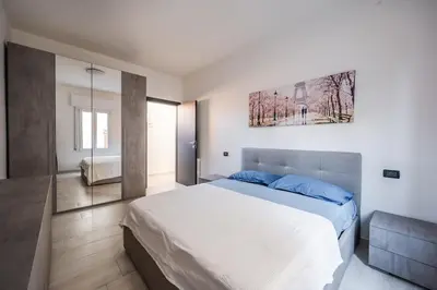 Letto o letti in una camera di Smart Life House in the heart of Modena