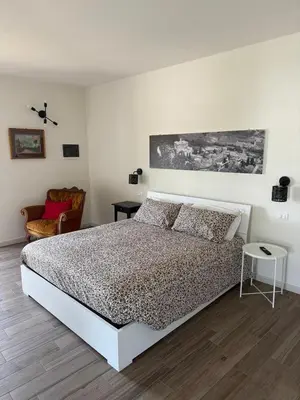 Letto o letti in una camera di Il Monastero di Qua
