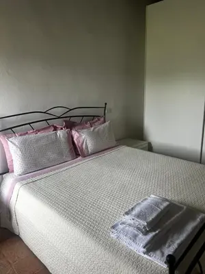 Letto o letti in una camera di Il Pozzo