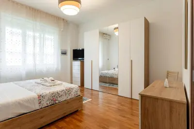 Letto o letti in una camera di GuestHost - Casa Viviana