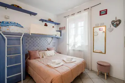Letto o letti in una camera di GuestHost - La Casa di MoRo