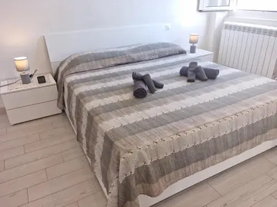 Letto o letti in una camera di homeloly - 230 dalla stazione di migliarina perfetta per le 5 terre