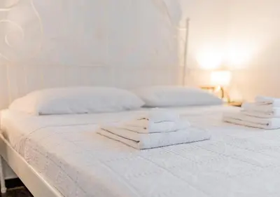 Letto o letti in una camera di MaRenà - appartamento vista mare, a 30metri dalla spiaggia di Renà, Riva Trigoso - Sestri Levante