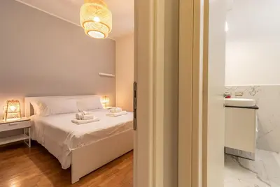 Letto o letti in una camera di La casa del Vicolo 2 camere letto, Wi-Fi Aria Condizionata