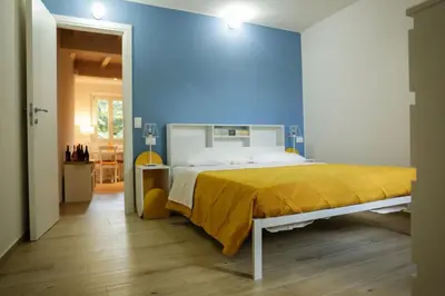 Letto o letti in una camera di Good Vibes apartment centro storico Reggio Emilia