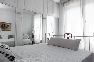 Letto o letti in una camera di Charme & Comfort, Maison di Stile, Sestri Levante