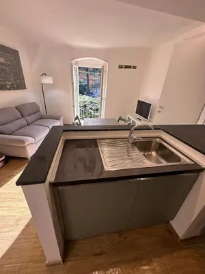 Cucina o angolo cottura di Kiwi home in the historic center with a small terrace