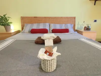 Letto o letti in una camera di Karma House
