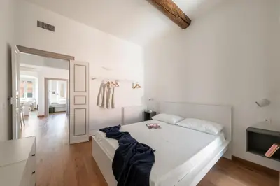 Letto o letti in una camera di Casa Tigullio