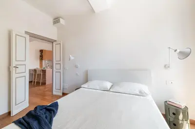 Letto o letti in una camera di Casa Tigullio