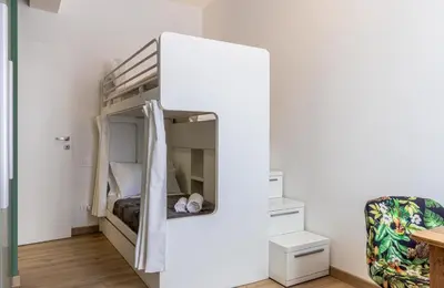 Letto o letti in una camera di Green Lux-Via Canalino- Pass ZTL Parking WiFi