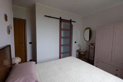 Letto o letti in una camera di Casa Febe