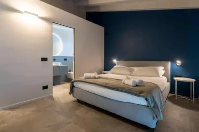 Letto o letti in una camera di VILLA SANT' AMBROGIO - Relax di Lusso a Zoagli