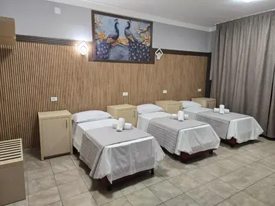 Letto o letti in una camera di Modena Hotel