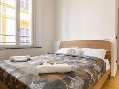 Letto o letti in una camera di Centro Storico Modena - Ascensore - Pass ZTL