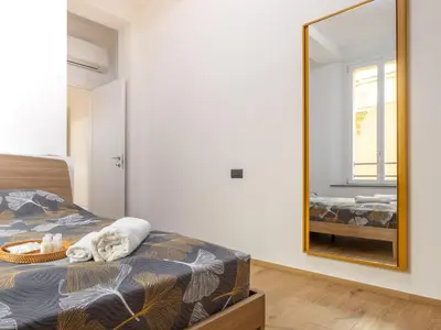 Letto o letti in una camera di Centro Storico Modena - Ascensore - Pass ZTL