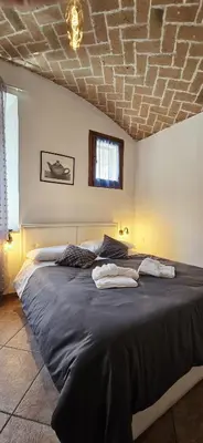 Letto o letti in una camera di Guest Holiday Nonantola