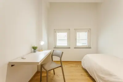 Letto o letti in una camera di Mutina Domus - Comfort and elegance in the center