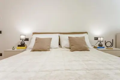 Letto o letti in una camera di Mutina Domus - Comfort and elegance in the center