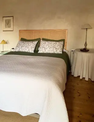 Letto o letti in una camera di Agriturismo Viridarium